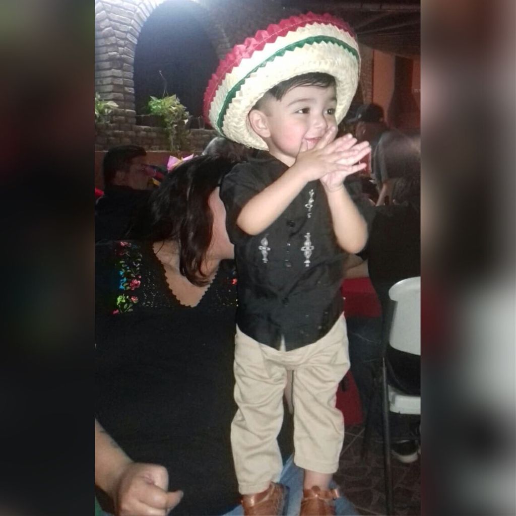 image of a boy in a Mexican-themed hat