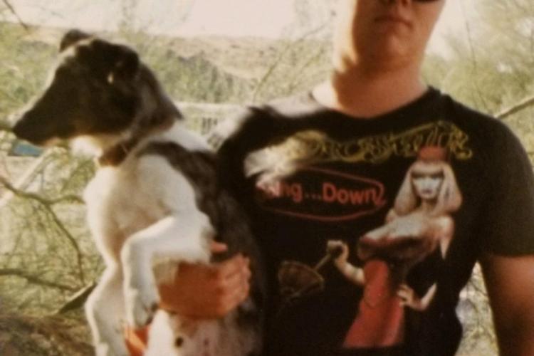 The author in younger, rowdier days Man holding dog