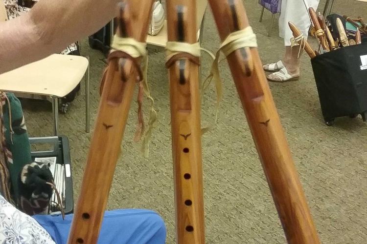 A flute with three tubes.